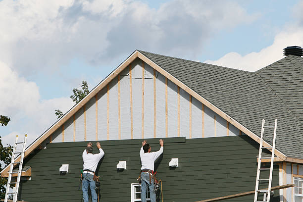Professional Siding Contractor technician working in Lindenhurst, NY